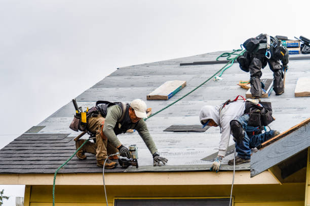 Professional Emergency Roof Repair technician working in Pelham, NH